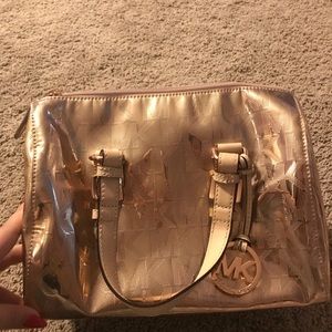 Rose gold Michael kors duffle bag